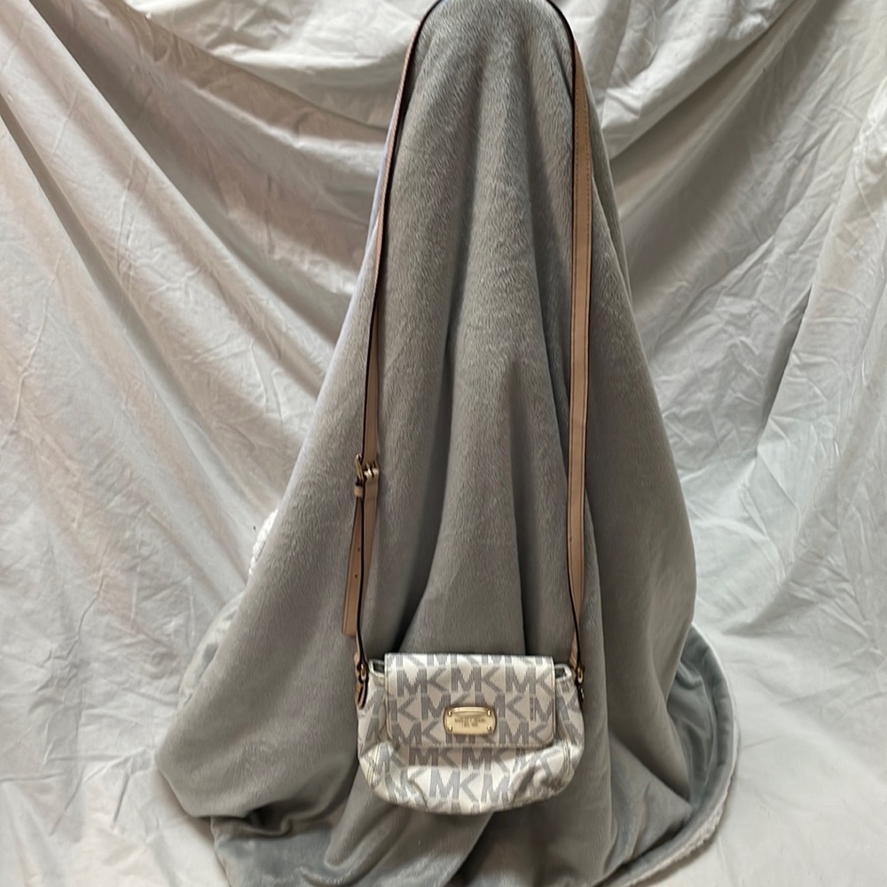 Michael Kors shoulder bag with strap.